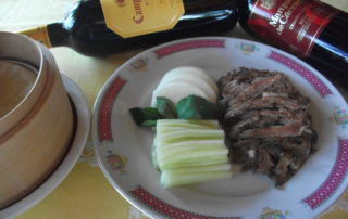 Pato con tortitas Pato